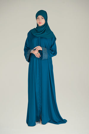 Front view of Zareen Abaya in zinc shade featuring front-open design and box-pleated sleeves