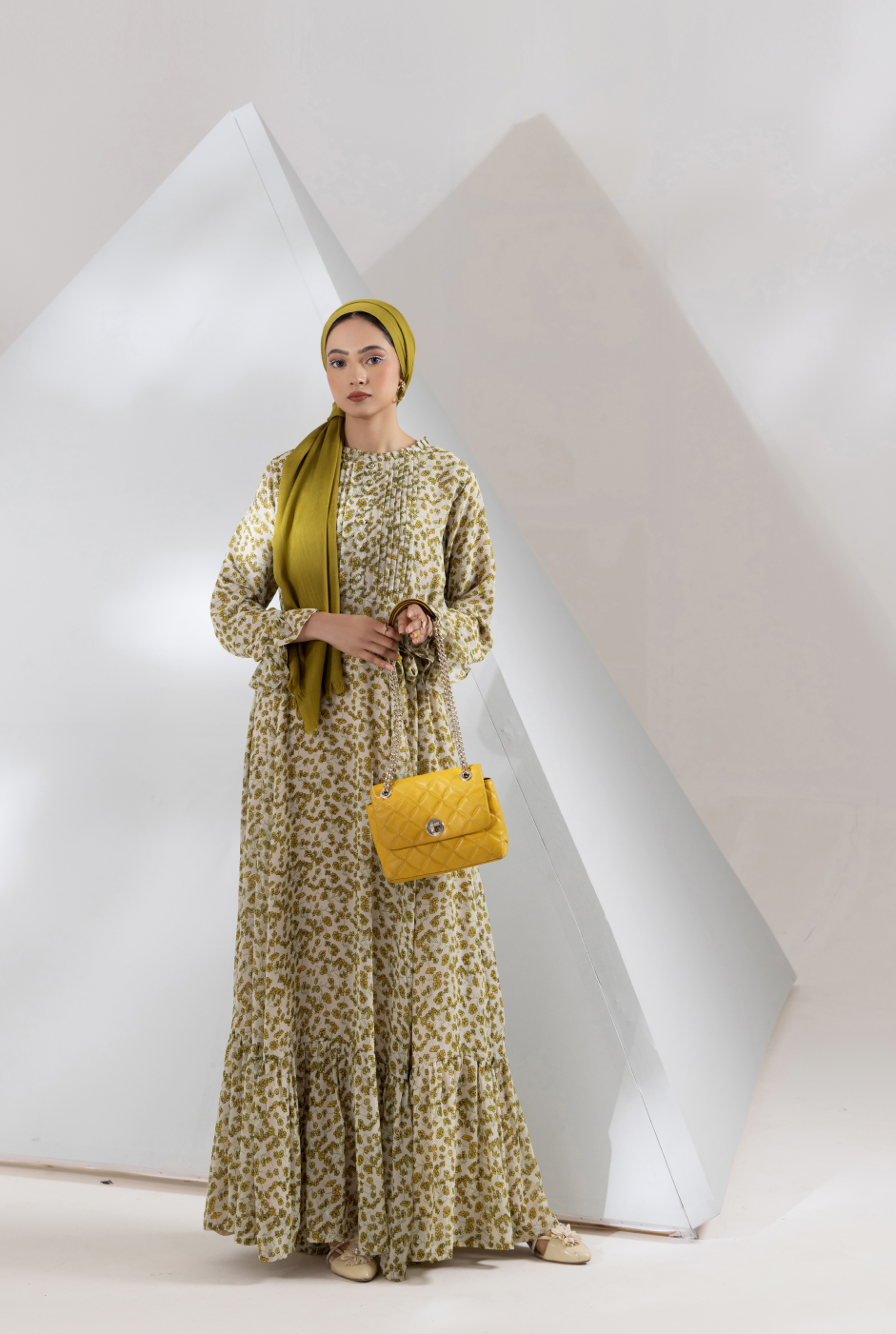 Front view,  cream digital printed chiffon maxi with frilled tiers and belt