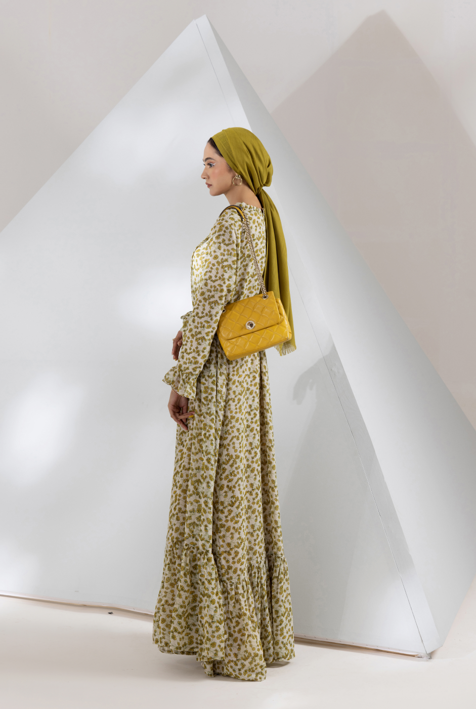 Front view,  cream digital printed chiffon maxi with frilled tiers and belt