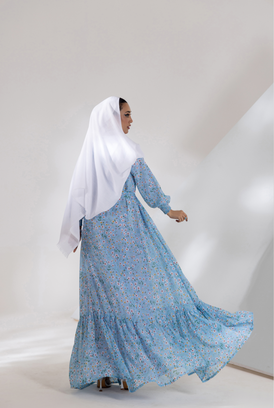 Front view, maxi with cross pin-tuck design and round neckline