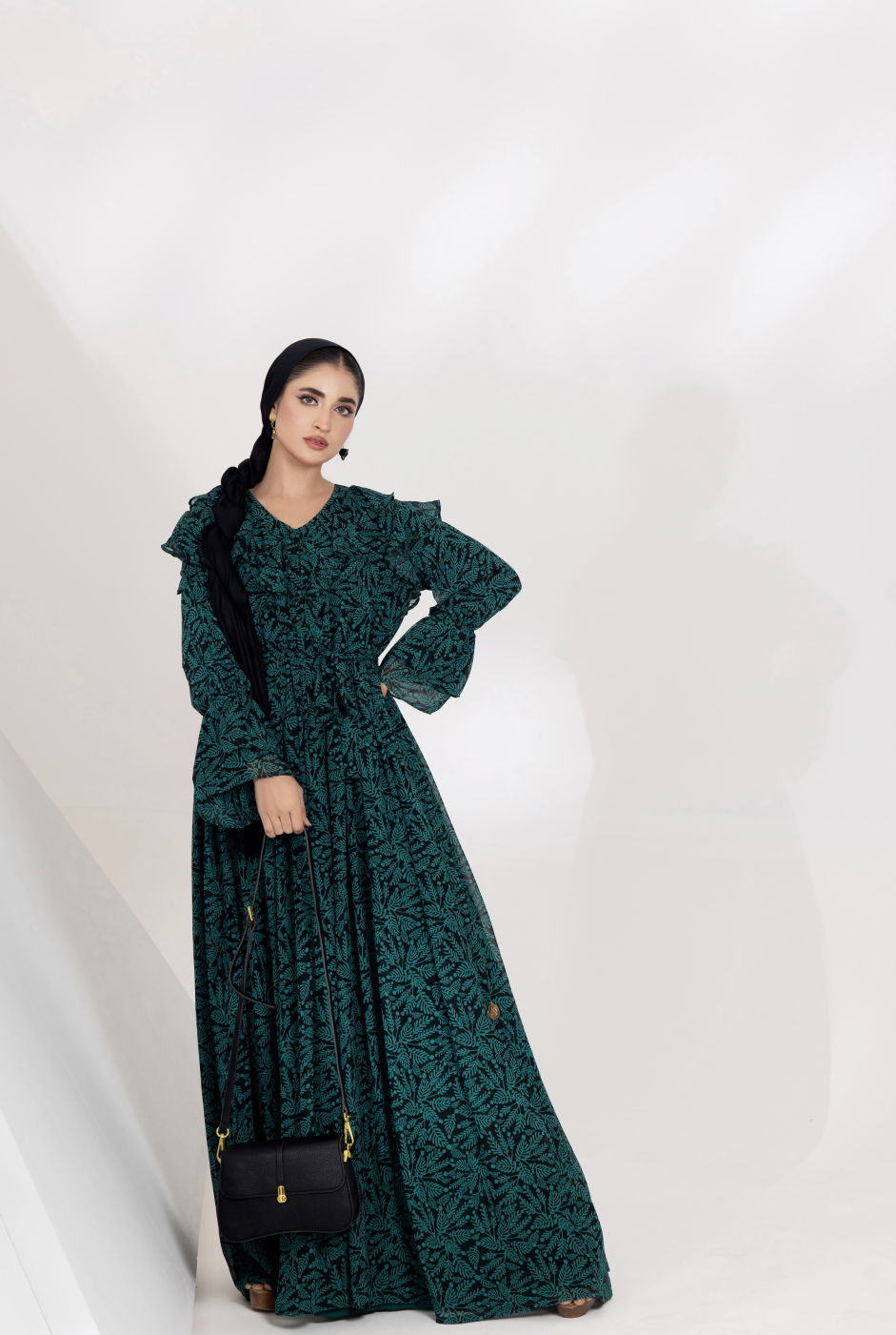 Front view, Black chiffon panelled maxi with V neckline and ruffled front