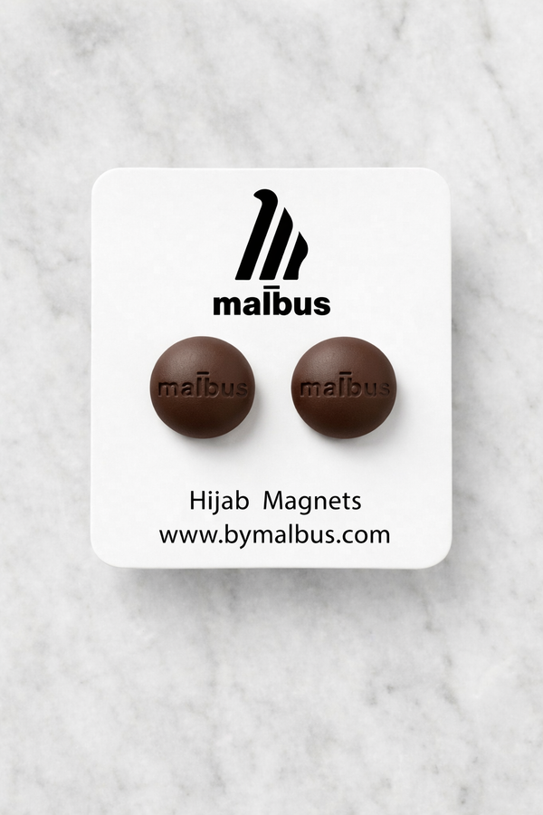 Mauve taupe hijab magnets from MALBUS displayed as a pair, showing smooth premium magnetic closures designed to secure hijabs without pins or damage to delicate fabrics