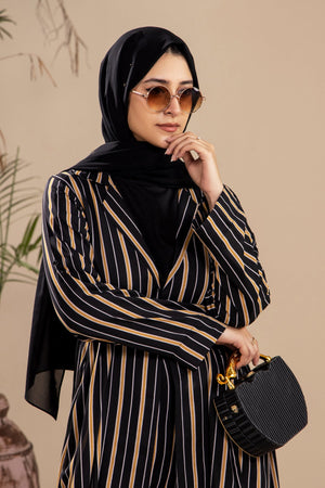 Close view of women’s jacket showing stripes and tie waist – co-ord set